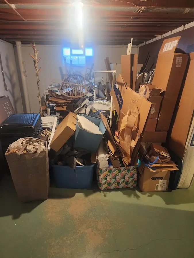 Roll-off dumpster container at job site for 2 Yard Dumpster Rental in Angola